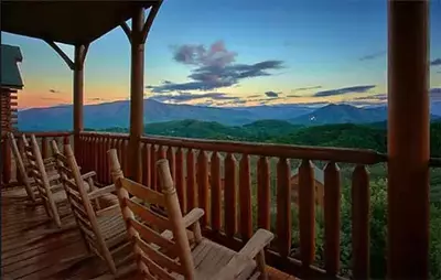 sunrise view from deck of Moonlit Mountain Top cabin