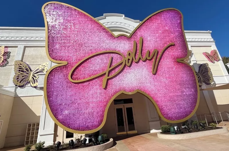 pink Dolly butterfly sign at Dollywood's Dolly Parton Experience
